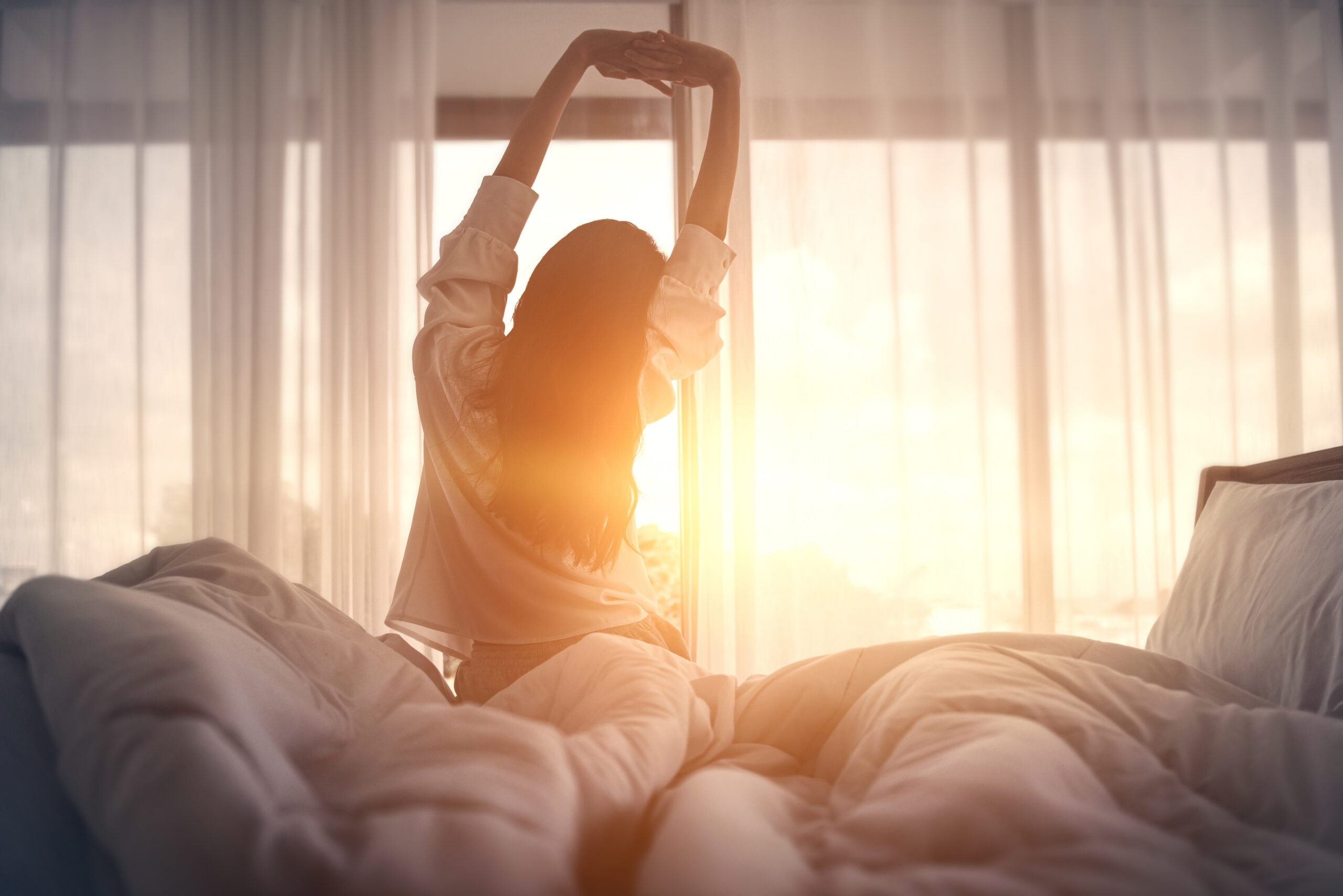 Featuring Dr. Andy Franklyn-Miller: 7 Simple Stretches You Can Do in Bed That Will Help You Sleep Better Tonight